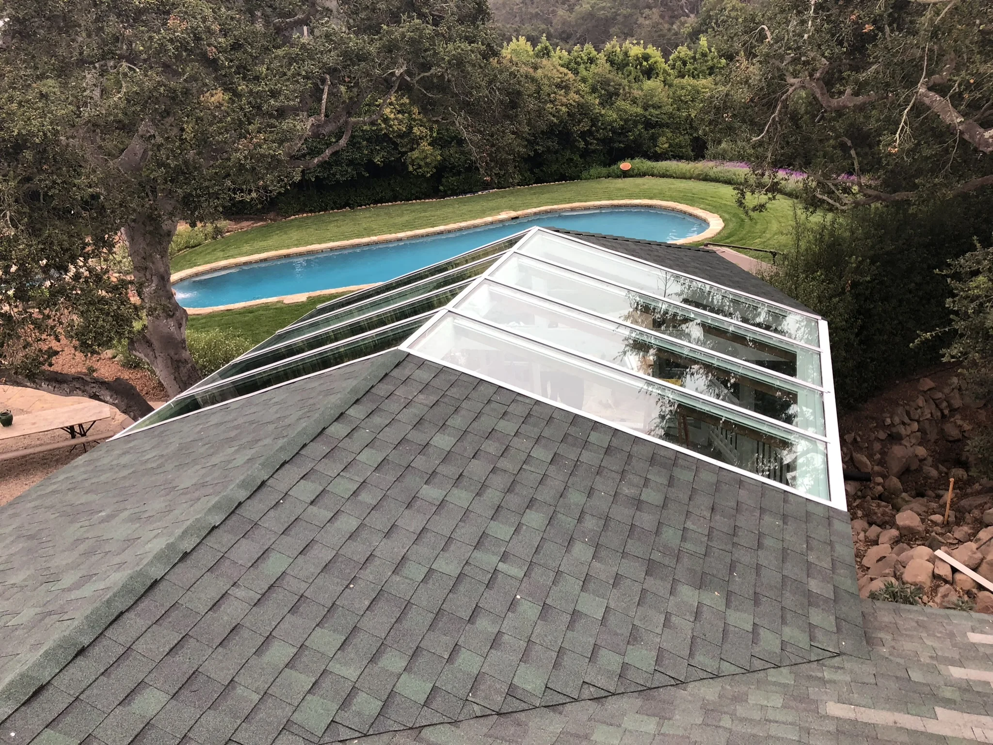 Large architectural glass skylight integrated into a roof