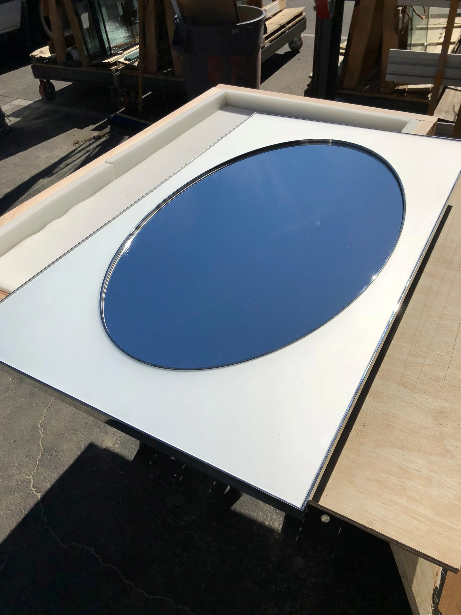 Floor-to-ceiling custom mirror wall in a hallway