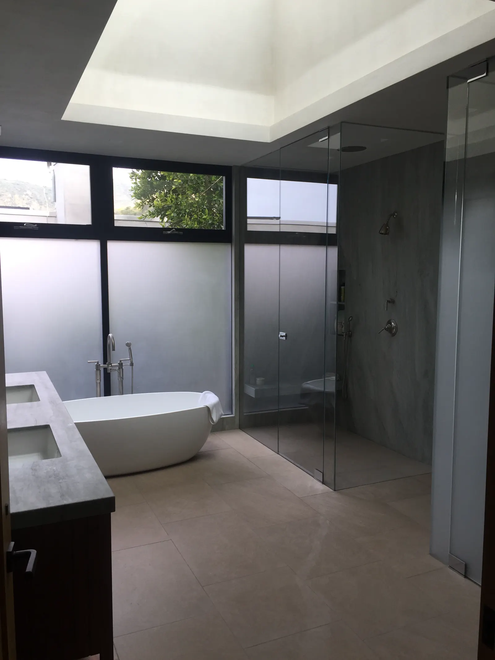 Glass skylight panels set in a structural frame