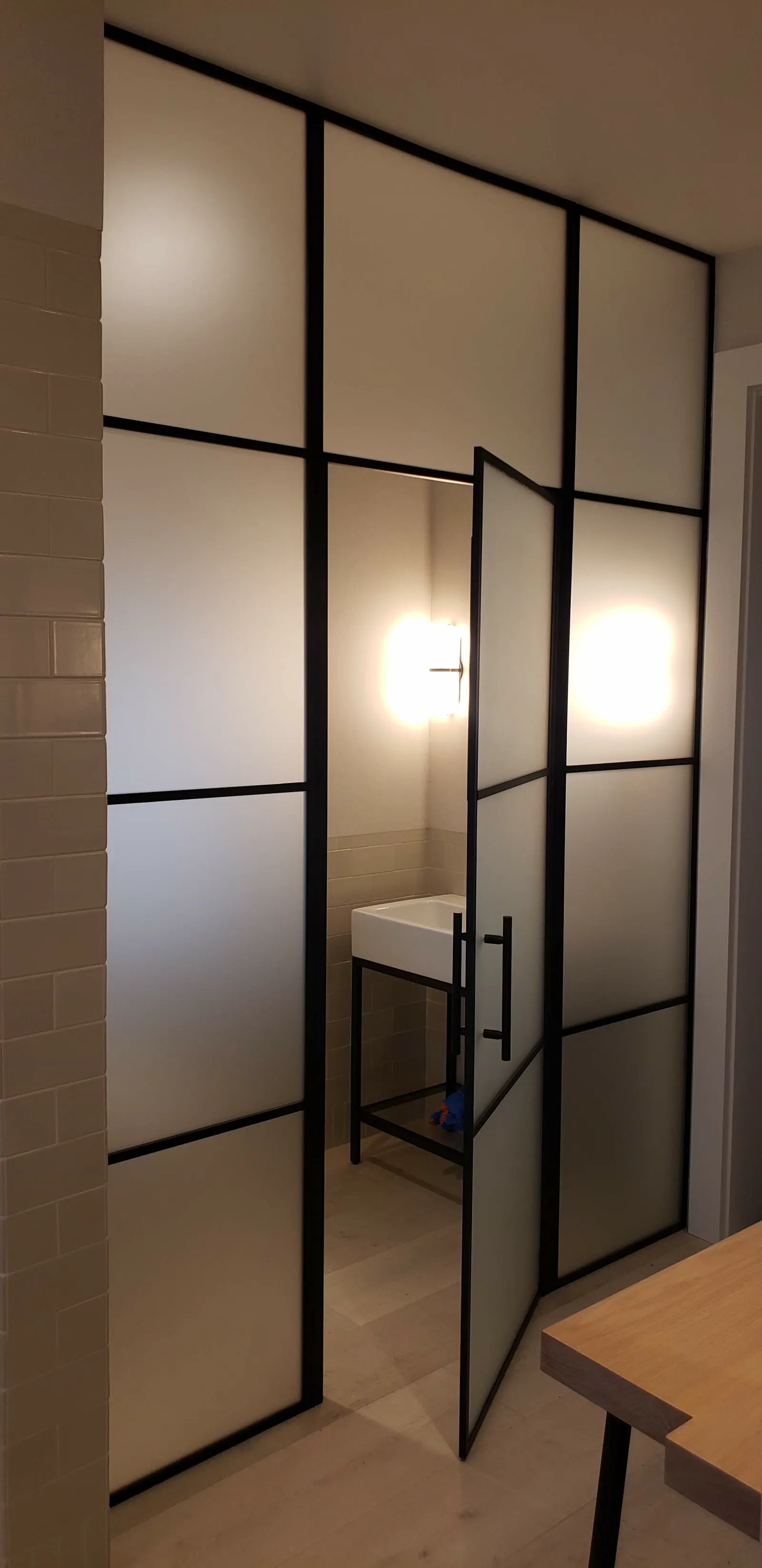 Black-framed grid of frosted glass panels