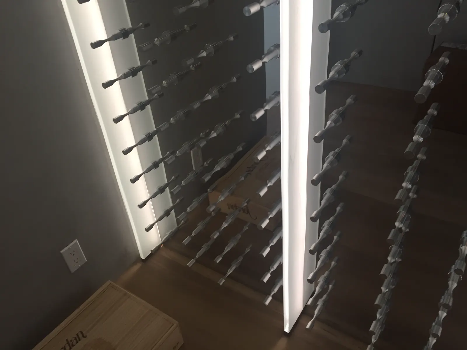 Illuminated glass wine cellar corner